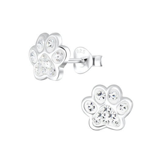 a pair of earrings with a paw print