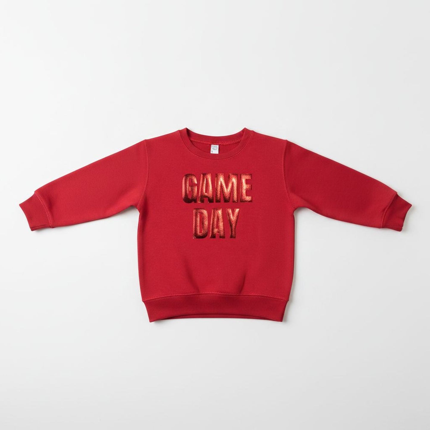 A red long-sleeved sweatshirt with the text "GAME DAY" printed on it.