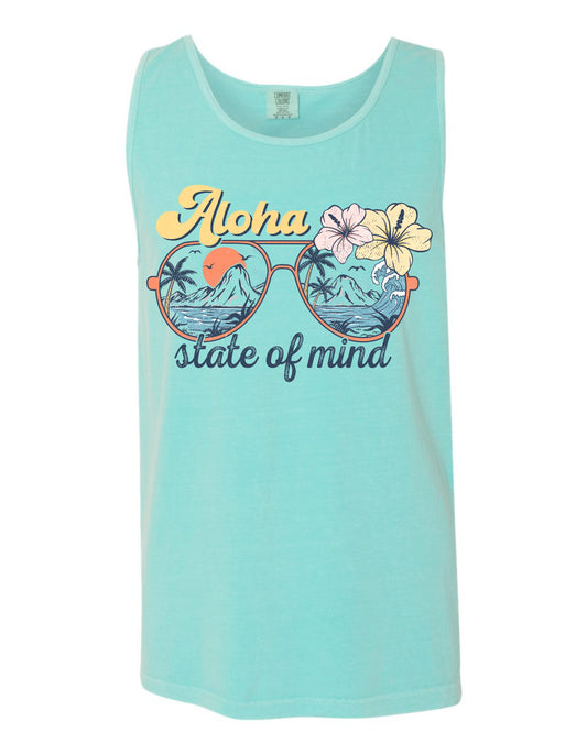A turquoise tank top with a graphic design featuring sunglasses with tropical flowers and the text "Aloha state of mind" printed on it.