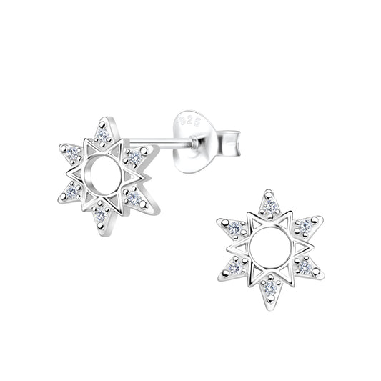 a pair of earrings with a star design