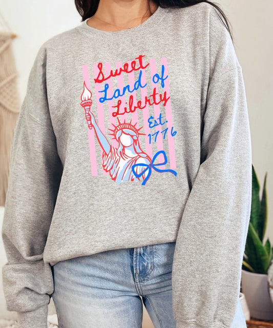 Sweet Land of Liberty Statue of Liberty Sweatshirt | Feminine Patriotic Bow Crewneck | USA 1776 Graphic Pullover