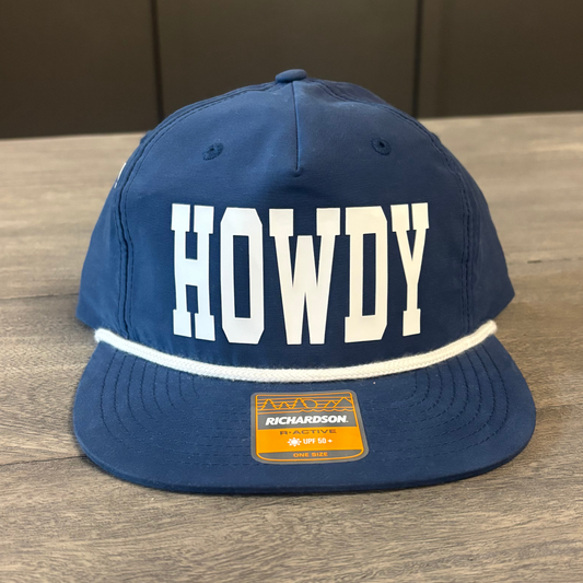 A navy blue baseball cap with the word "HOWDY" printed in white letters.