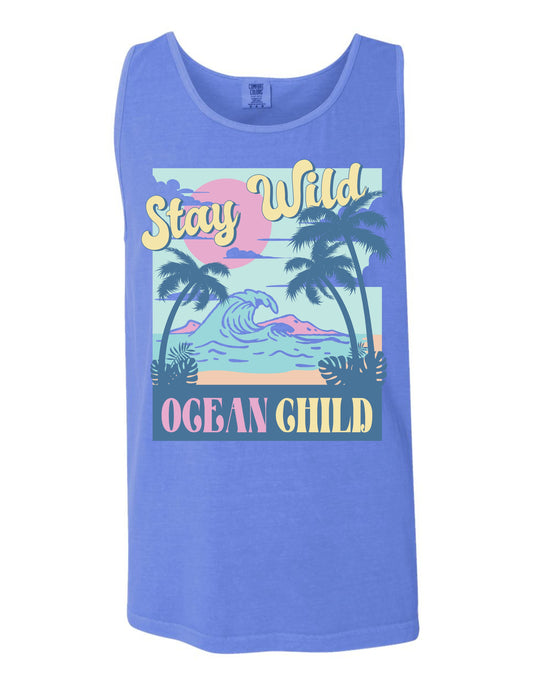 A blue tank top with a graphic design depicting palm trees, a sunset, and a wave, along with the text "Stay Wild Ocean Child" printed on it.