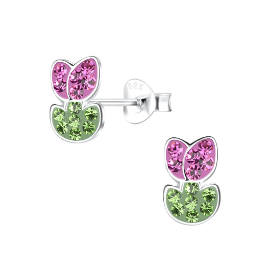 a pair of pink and green earrings