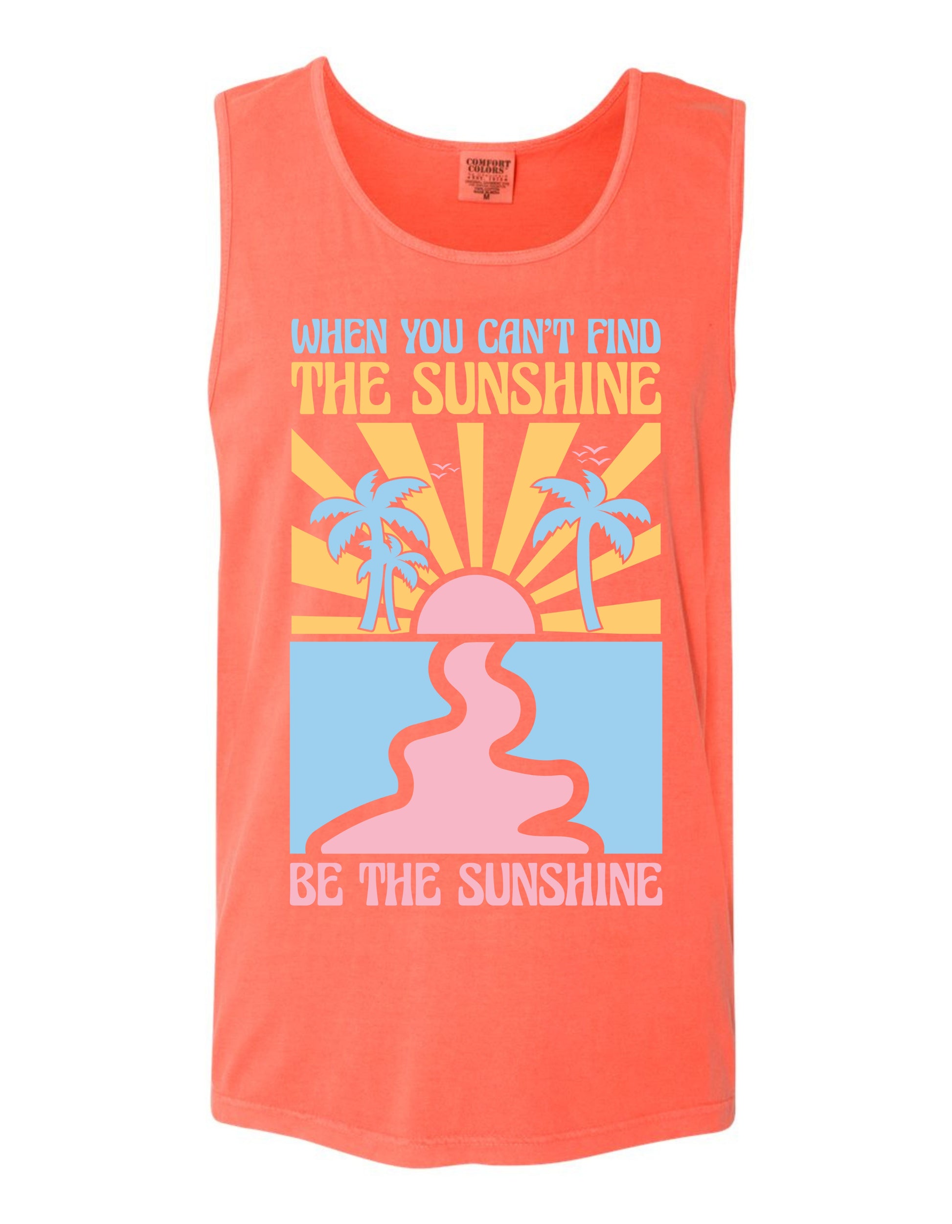 The image is a bright orange tank top with a graphic design featuring a sun and palm trees, along with the text "When you can't find the sunshine, be the sunshine".