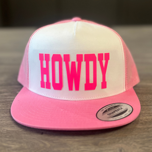 A pink and white baseball cap with the word "HOWDY" printed on it.