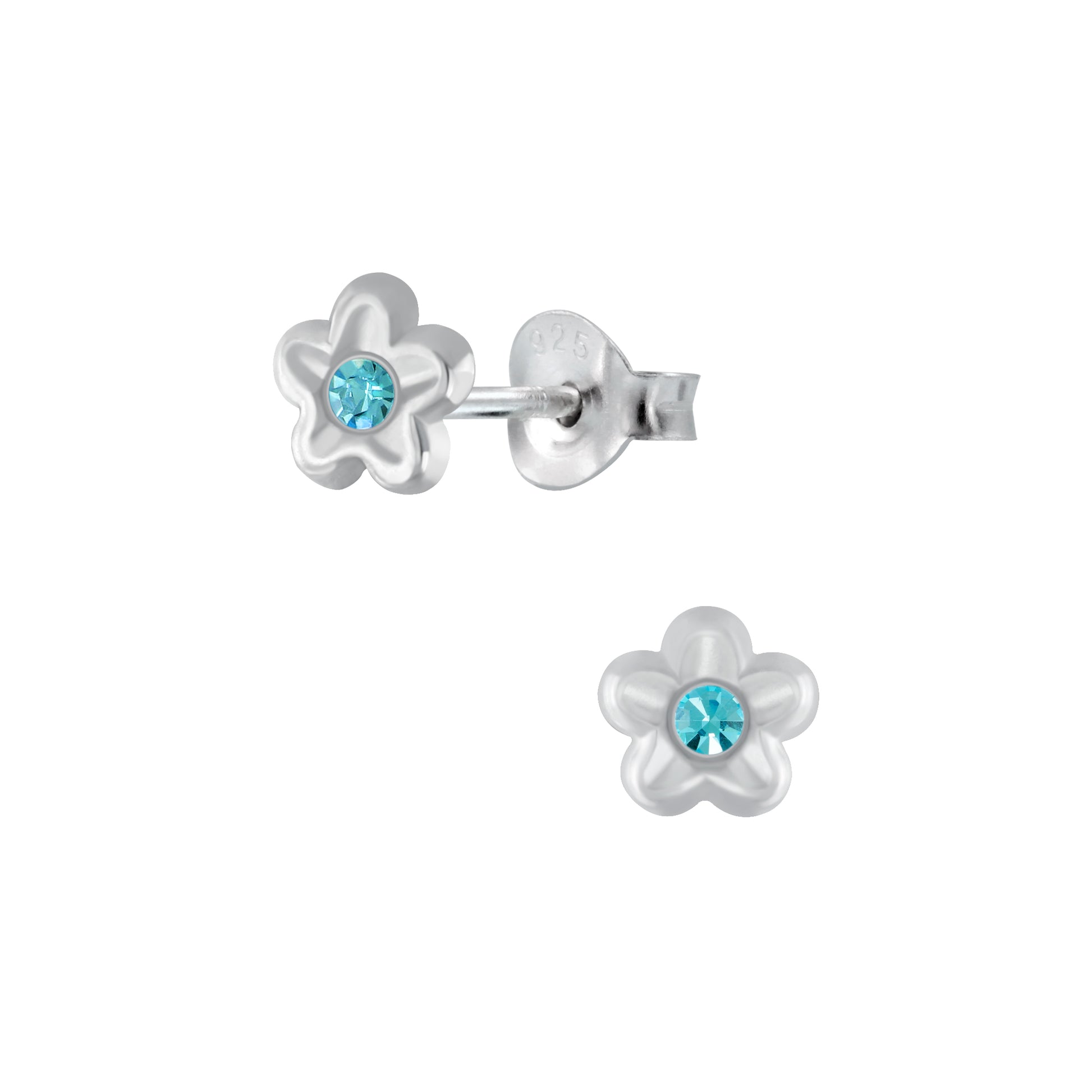 a pair of earrings with a flower design