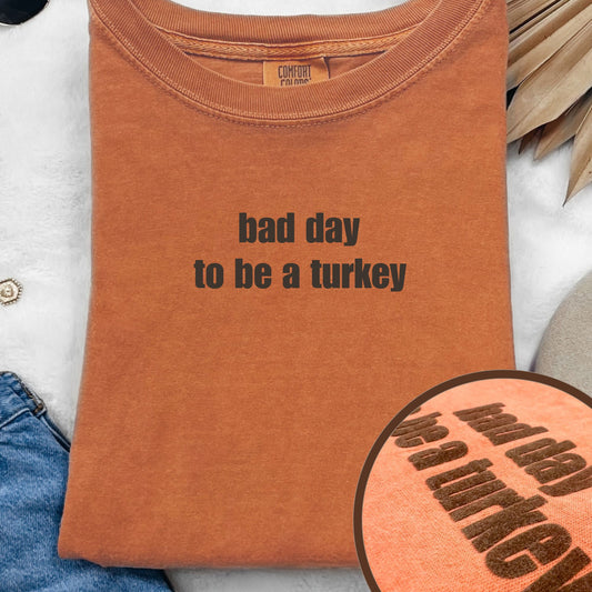 Bad Day to Be a Turkey T-Shirt in Yam with Brown Flocked Lettering