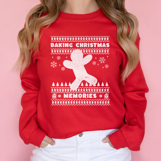 Woman wearing a red Baking Christmas Memories reindeer sweatshirt.