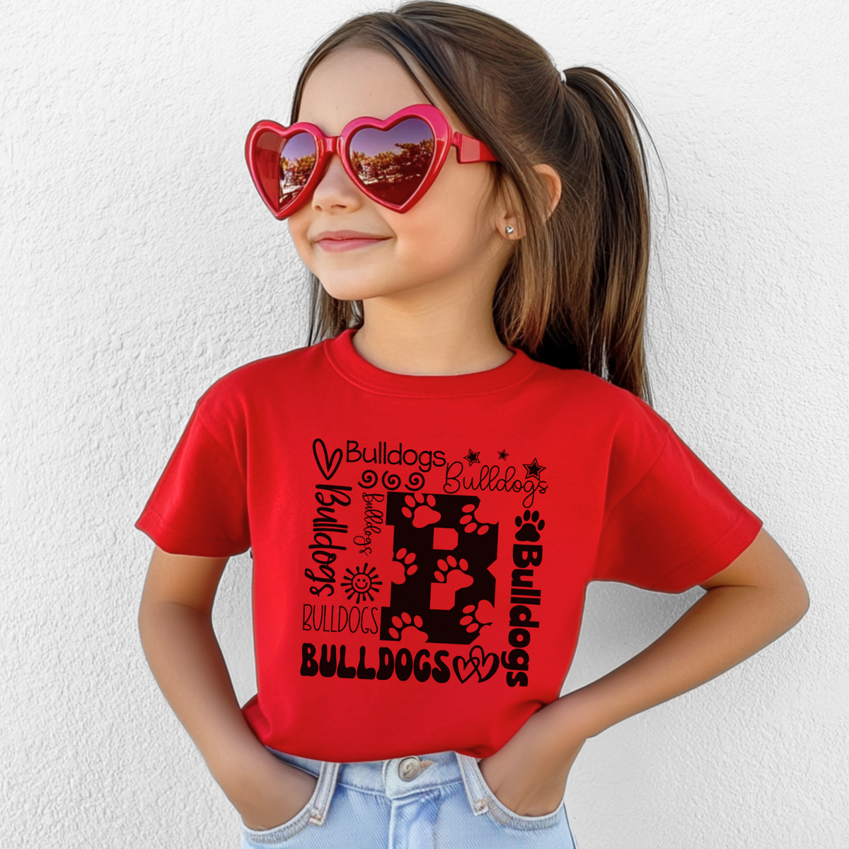 Bulldogs B collage design on Red Bella Canvas 3001Y youth T-shirt