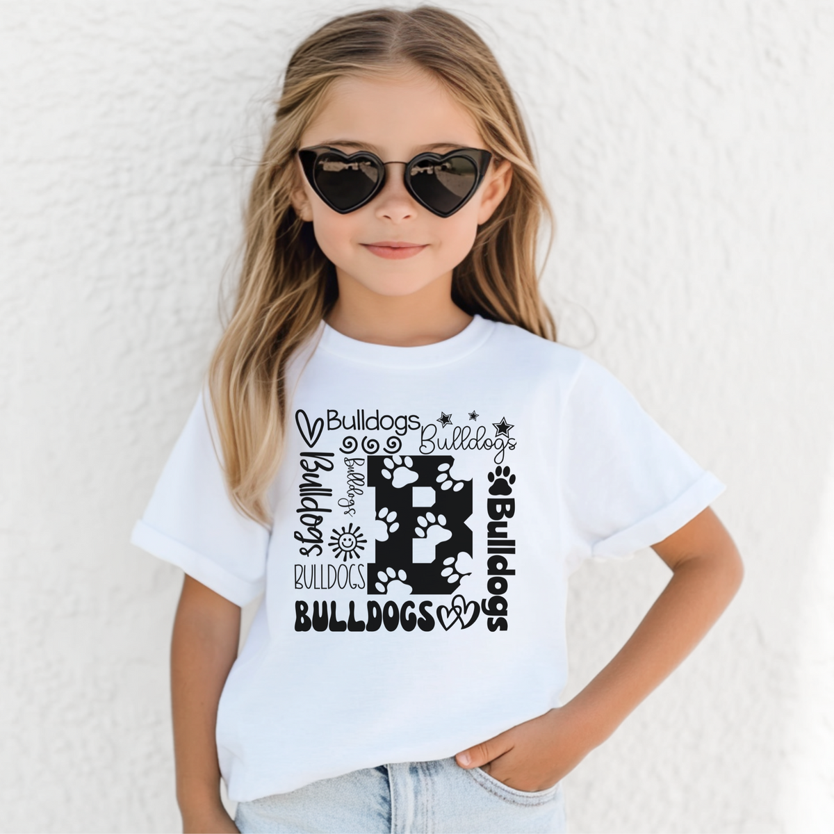 Bulldogs B collage design on White Bella Canvas 3001Y youth T-shirt