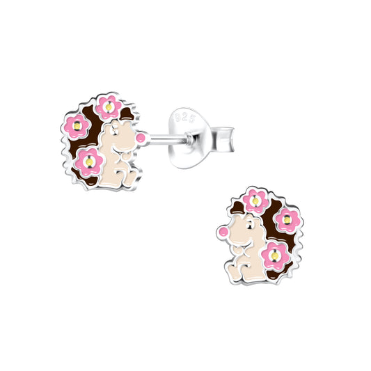 a pair of pink and brown sheep earrings