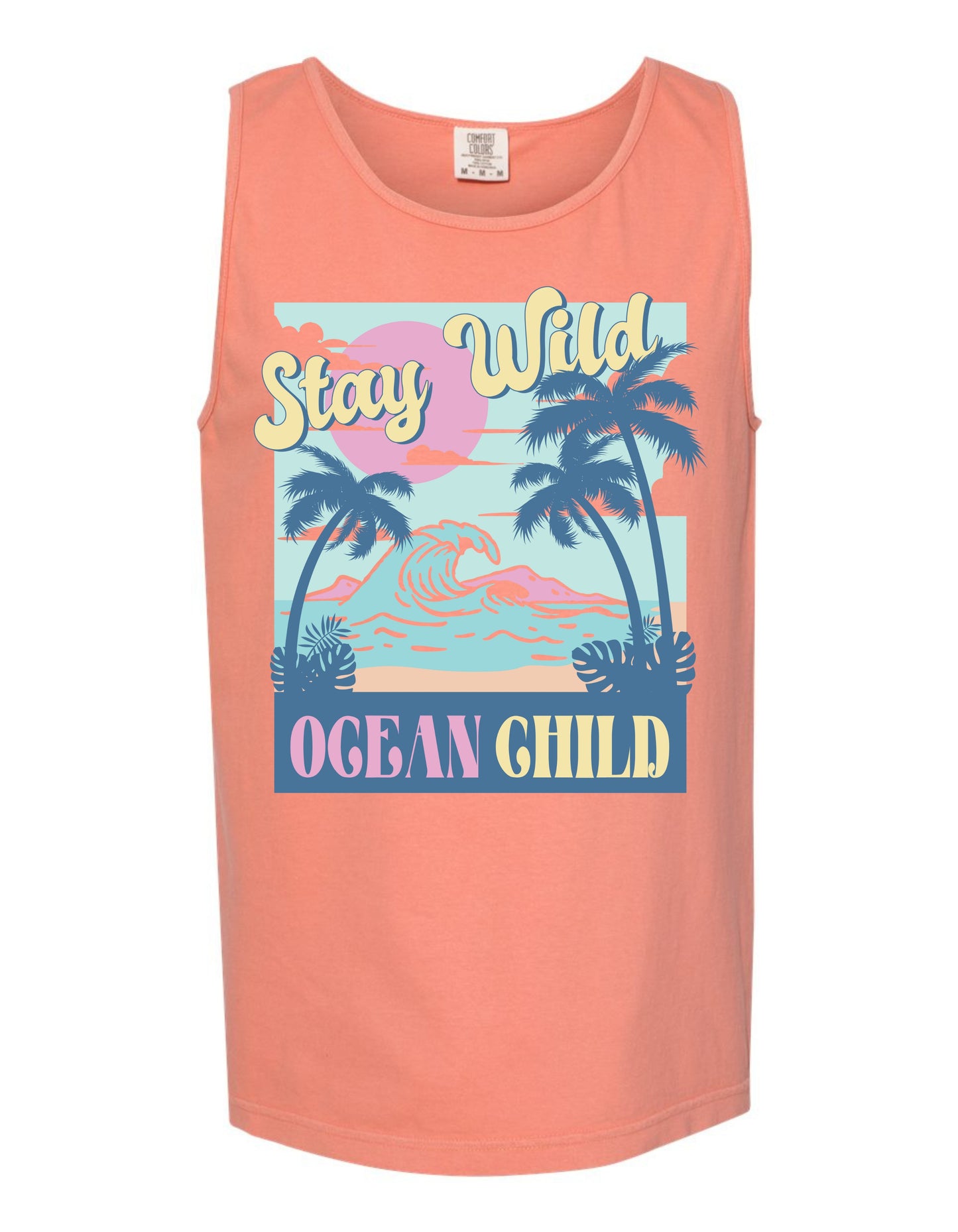 A pink tank top with a graphic design featuring palm trees, a sunset, and the text "Stay Wild Ocean Child" printed on it.