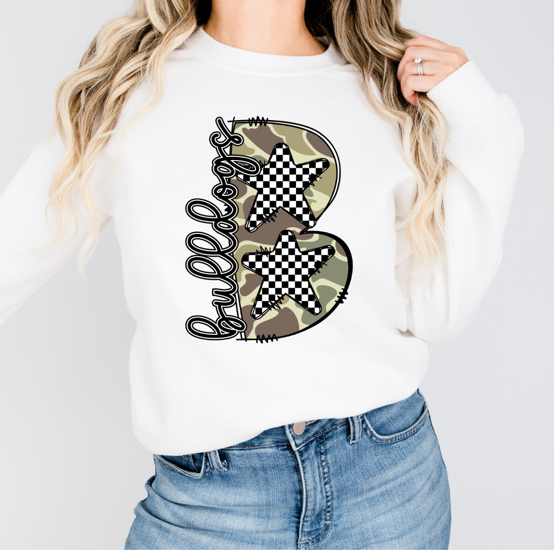 Woman wearing a White Bulldogs sweatshirt with camouflage B and checkered stars