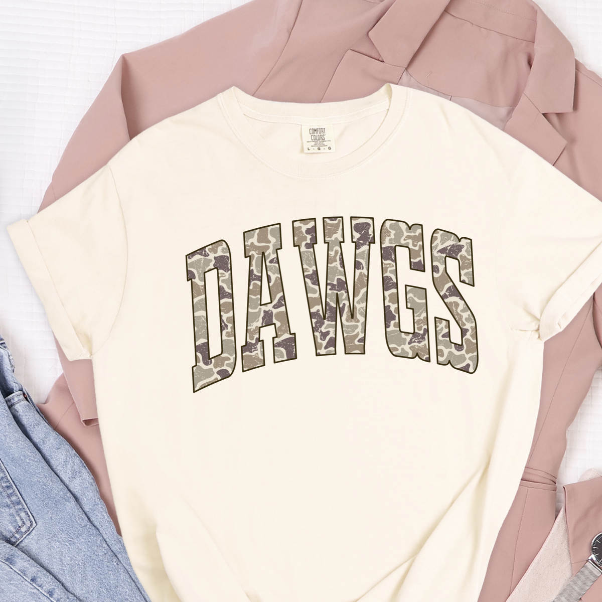 Camo DAWGS graphic on an Ivory garment-dyed T-shirt flat lay