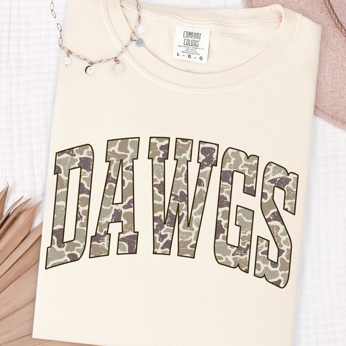 Folded Ivory garment-dyed T-shirt with Camo DAWGS graphic
