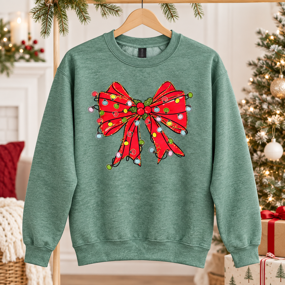 Dark heather green Gildan sweatshirt with red Christmas bow and multicolor lights, hanging
