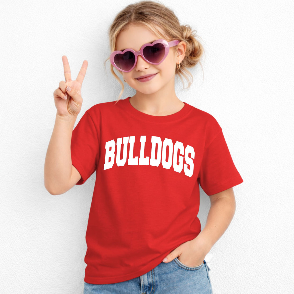 Red Gildan 5000B youth tee with white collegiate Bulldogs wordmark