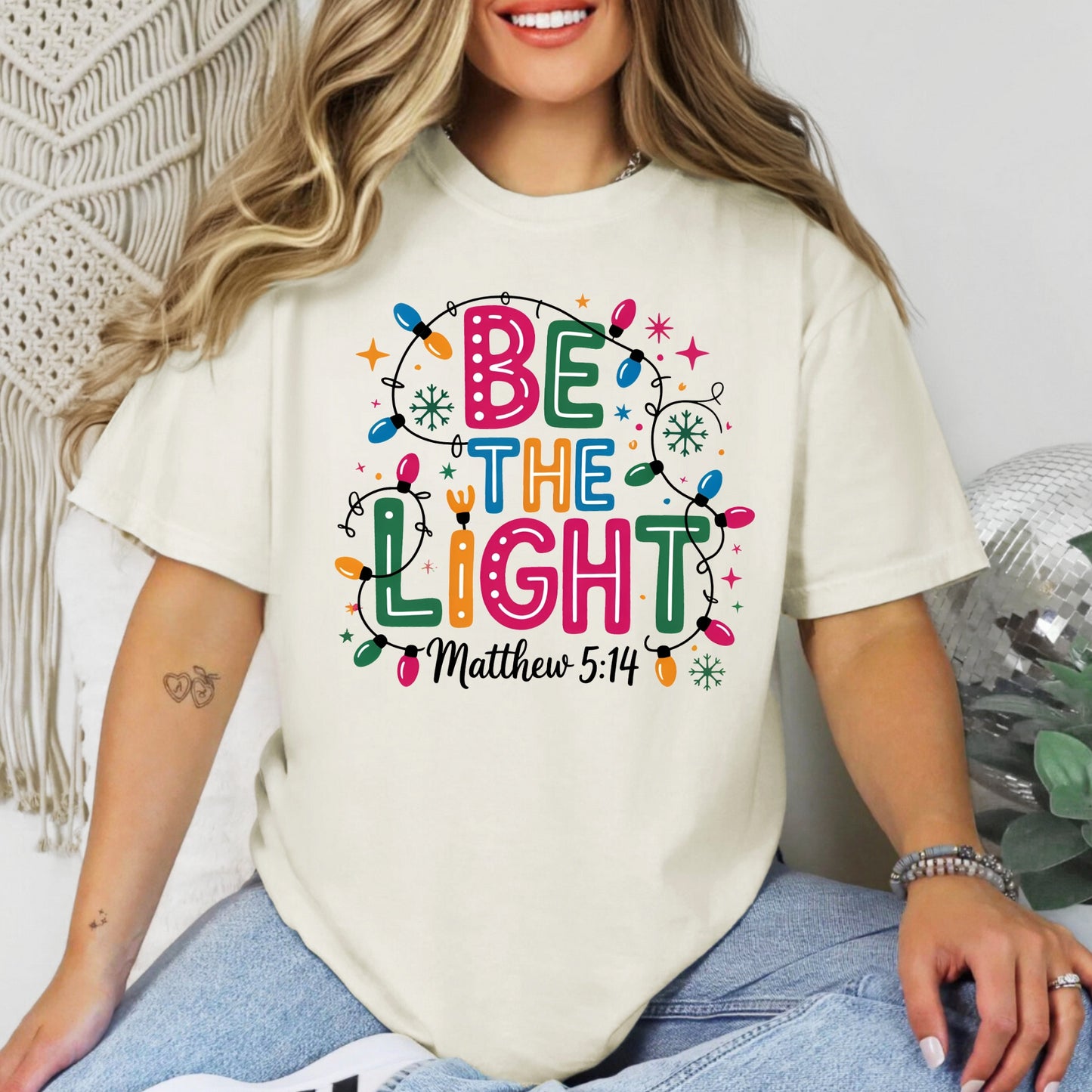 Be The Light – Matthew 5:14 Christmas Lights Comfort Colors Tee