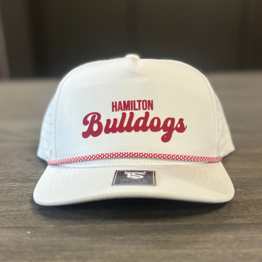 A white baseball cap with the text "HAMILTON BULLDOGS" printed on it.