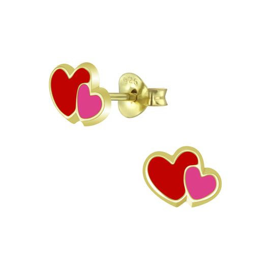 a pair of red and pink heart shaped earrings