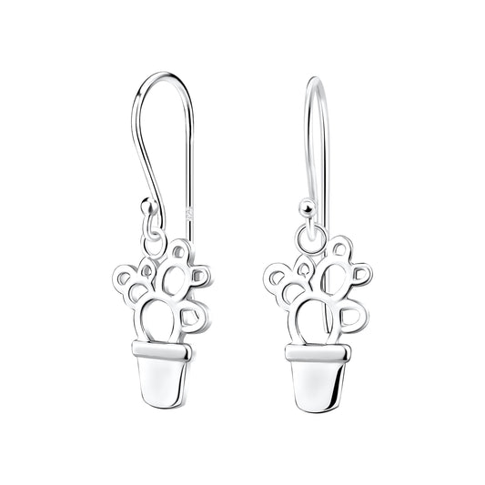 a pair of earrings with a flower in a pot