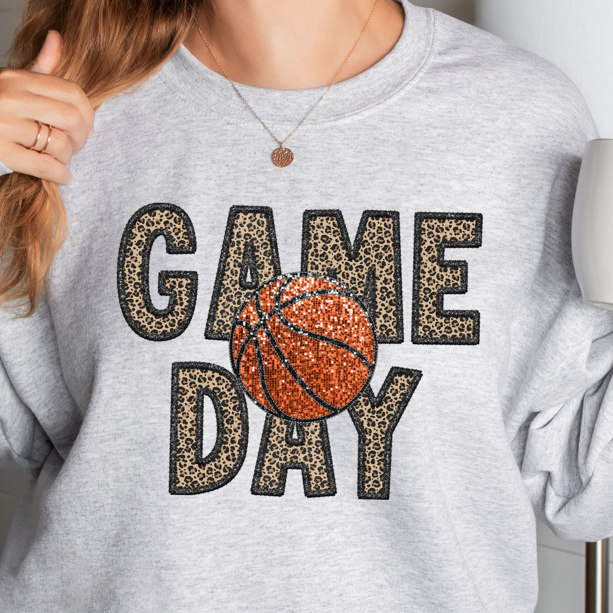 Grey reference crewneck sweatshirt with leopard GAME DAY lettering and orange basketball faux-sequin print
