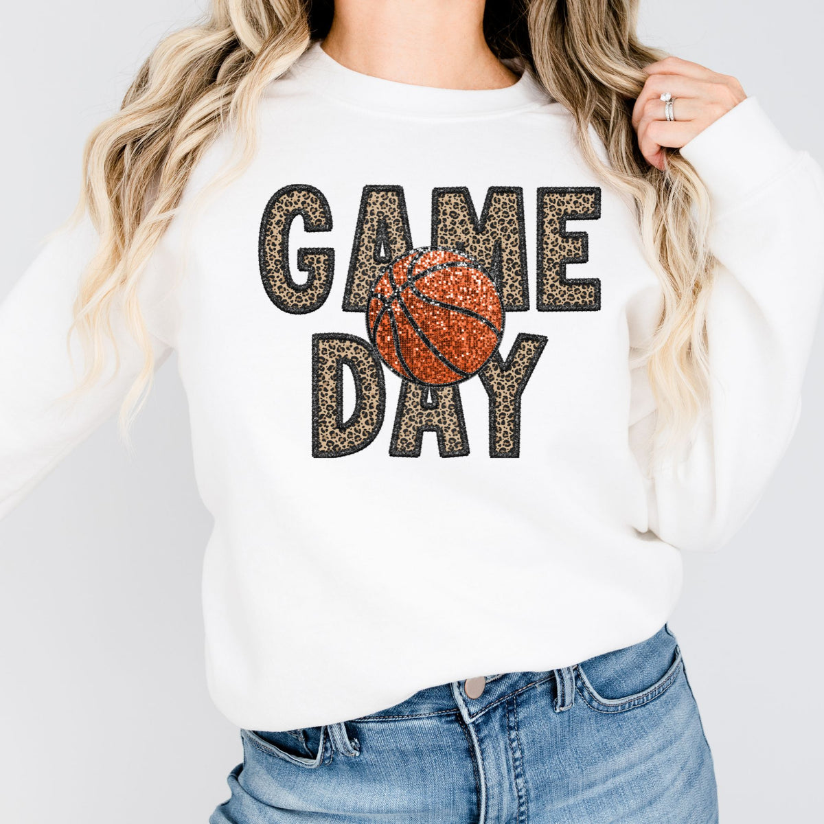 White crewneck sweatshirt with leopard GAME DAY lettering and orange basketball faux-sequin print