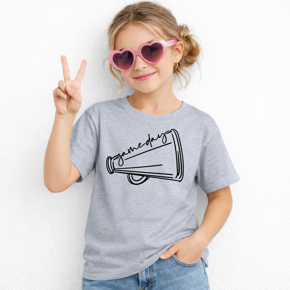 Girl wearing grey Game Day Megaphone Gildan 5000B youth tee