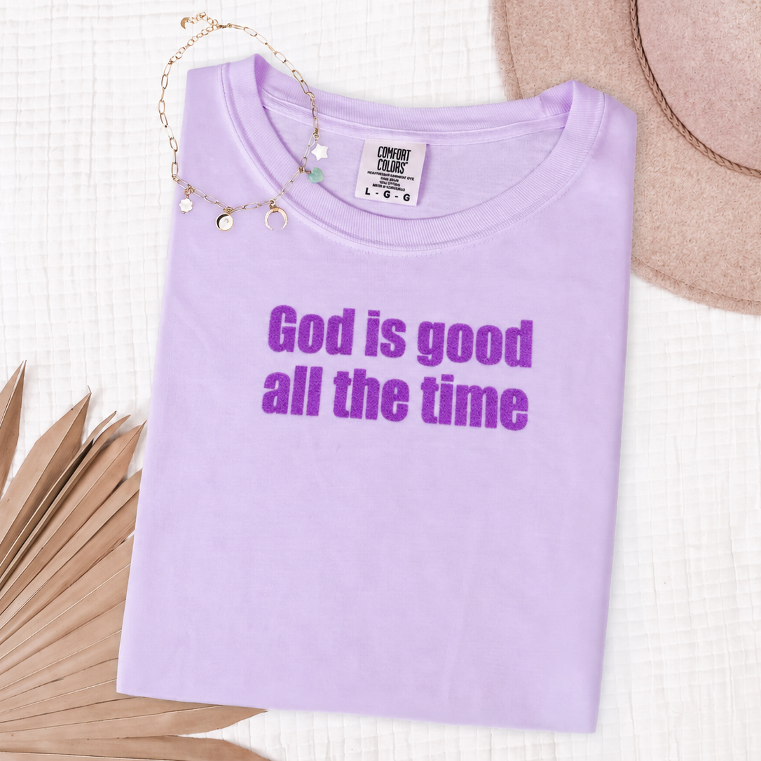 Orchid God Is Good All the Time Christian T-shirt flat lay