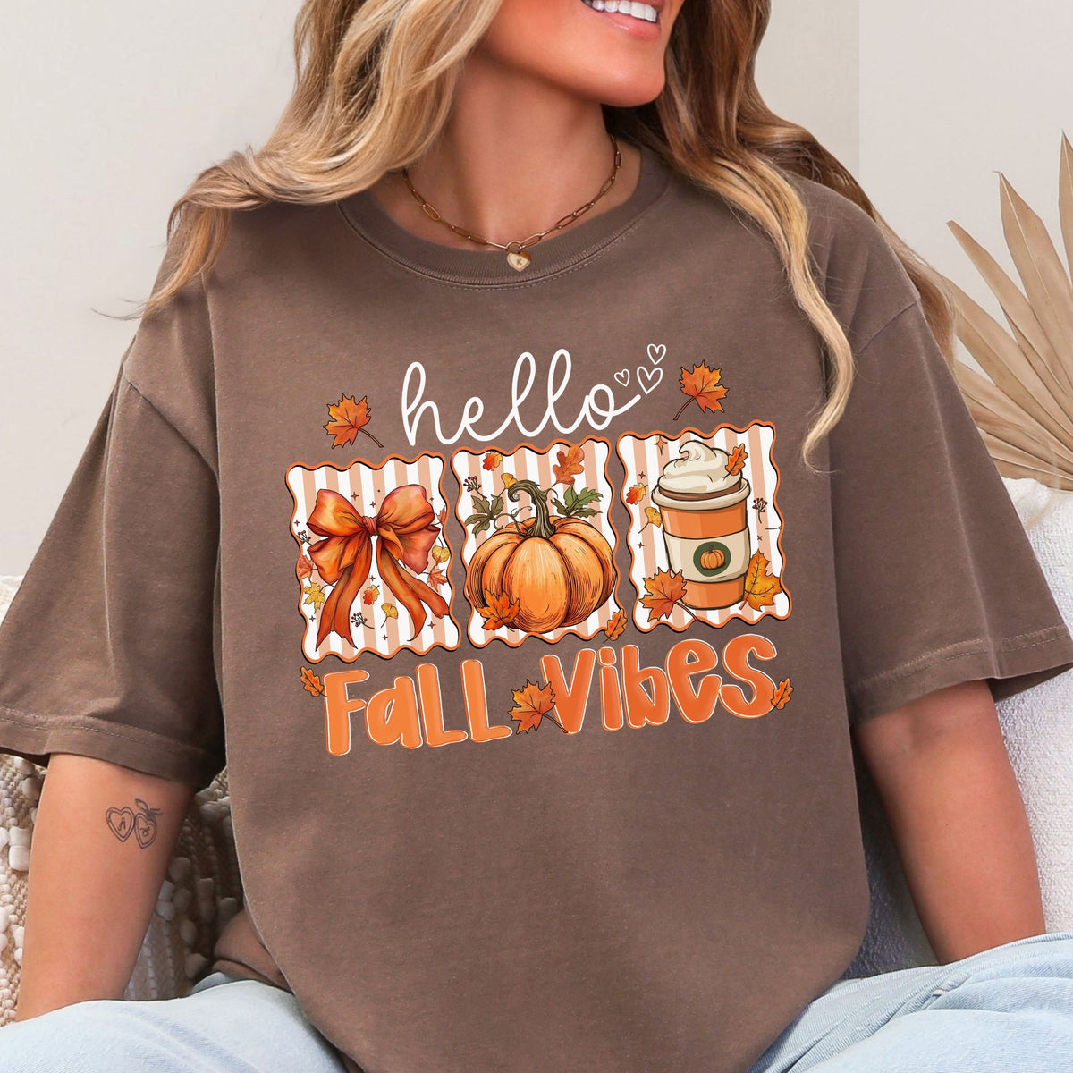 Hello Fall Vibes bow, pumpkin, and latte design on a Espresso T-shirt