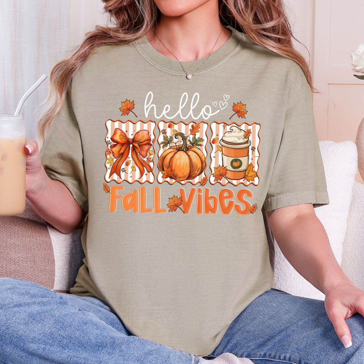 Hello Fall Vibes bow, pumpkin, and latte design on a Khaki T-shirt