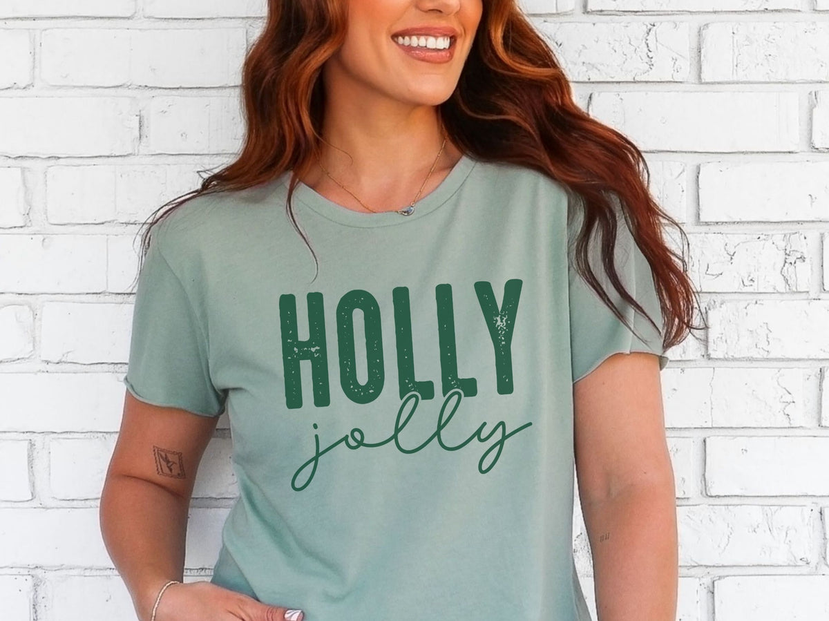 Stonewashed Green T-shirt with dark green HOLLY block lettering and jolly script lettering.
