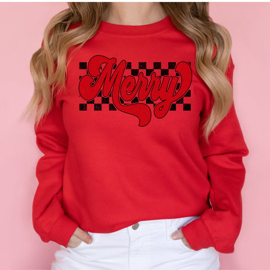 Red sweatshirt with Merry script and a black checkered Christmas design.