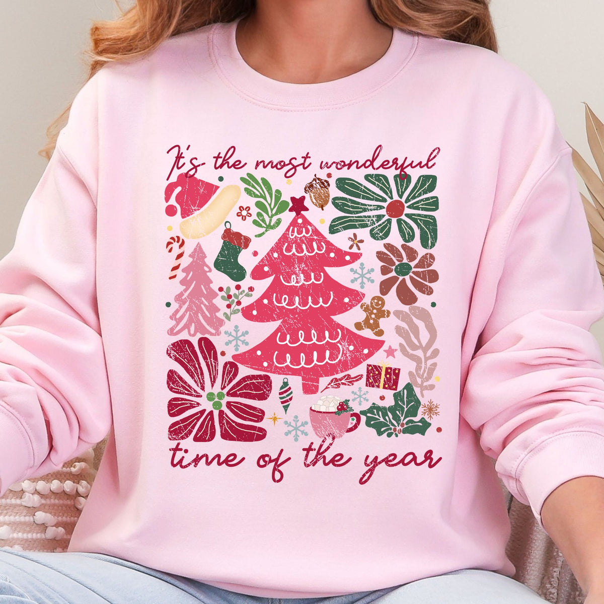 Light Pink sweatshirt with It's the Most Wonderful Time of the Year Christmas floral design.
