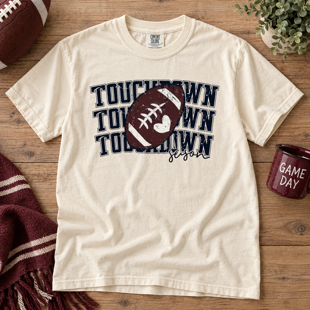 Ivory Comfort Colors Touchdown Season football shirt flat lay