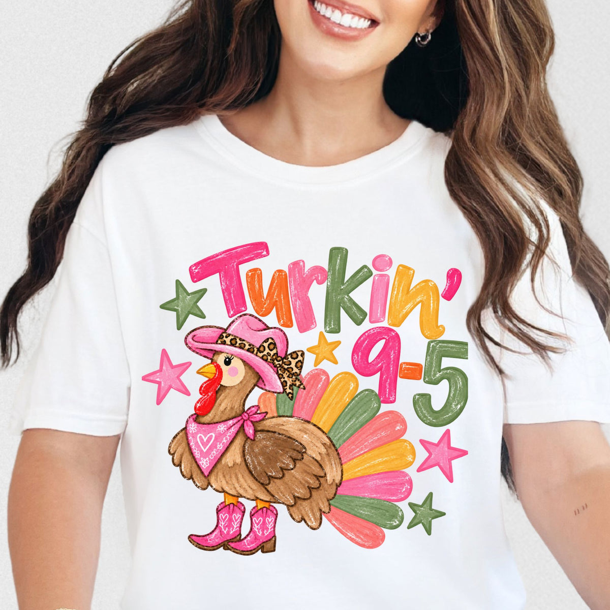 Cowgirl turkey in pink boots with Turkin’ 9–5 lettering on a White T-shirt