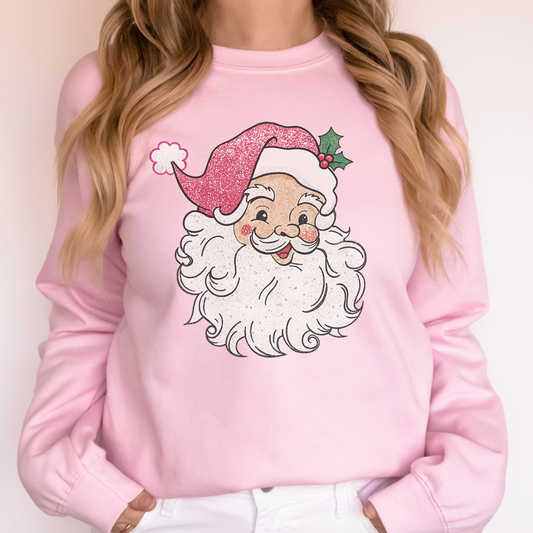 Vintage glitter Santa design on a light pink crewneck sweatshirt
